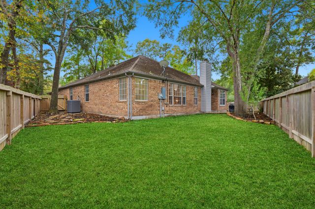 a view of a yard with a house and garden