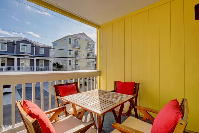a workspace with furniture window and wooden floor