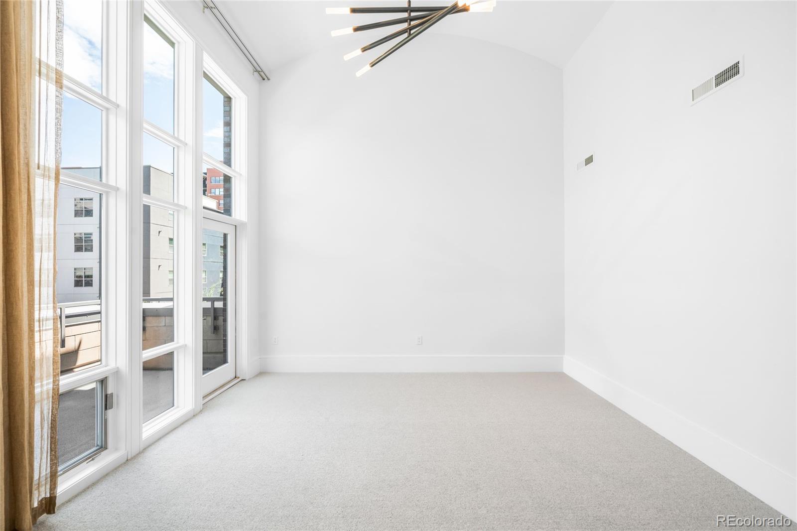 2133 18th Street, Unit RL Denver, CO 80202 - Photo 18 of 46 a view of an empty room