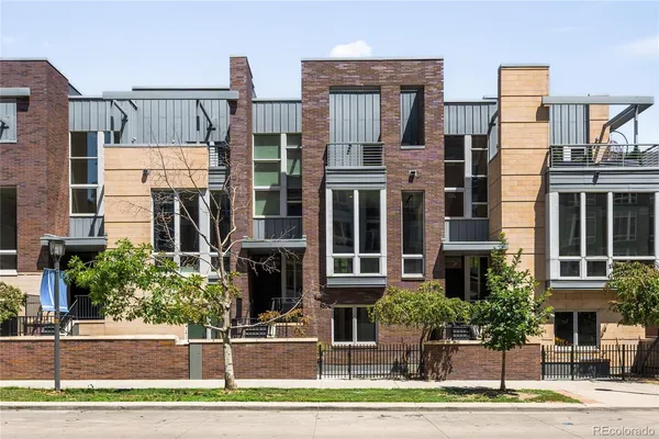 a front view of a building with street view
