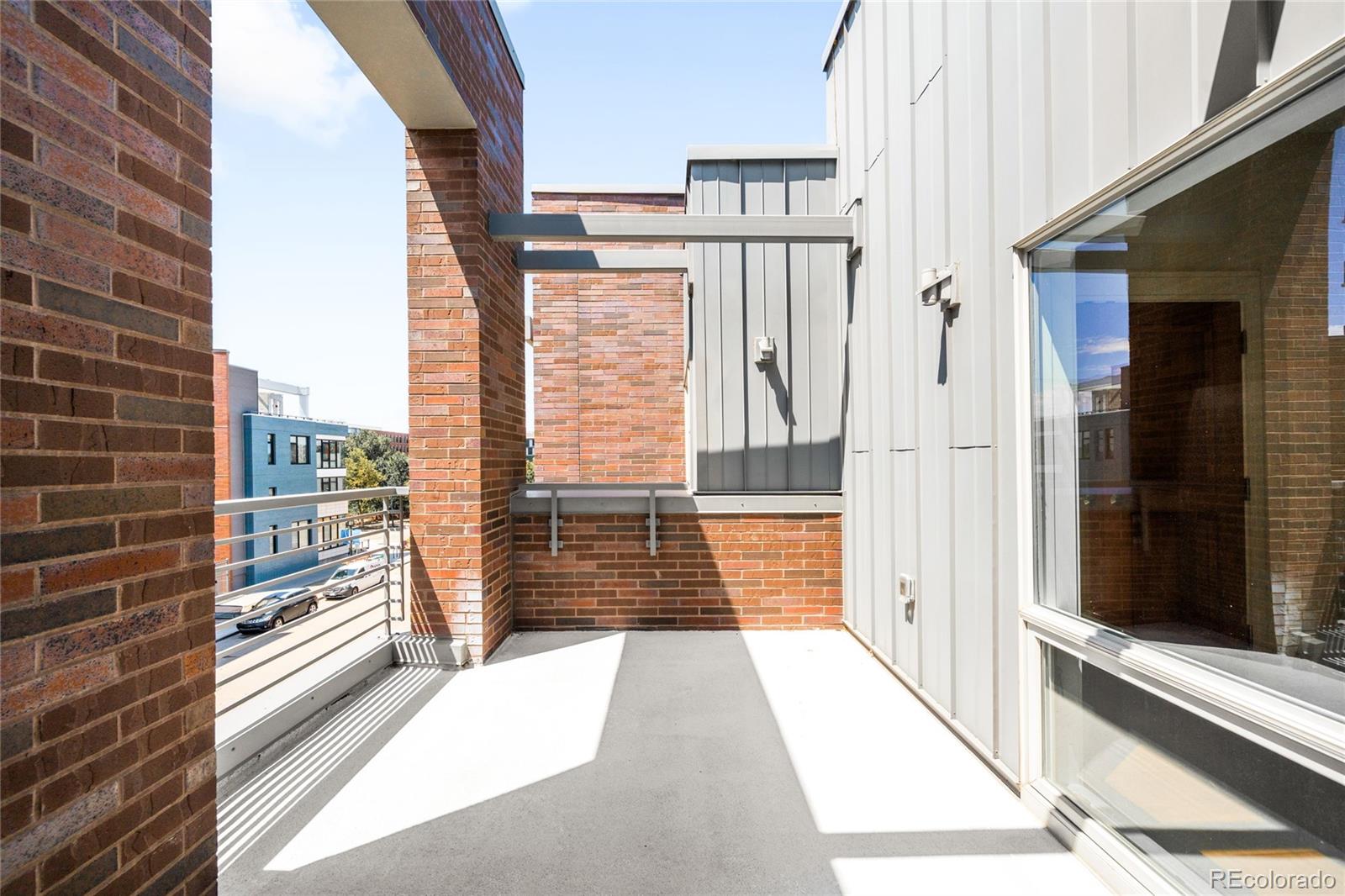 2133 18th Street, Unit RL Denver, CO 80202 - Photo 36 of 46 a view of a city from a balcony