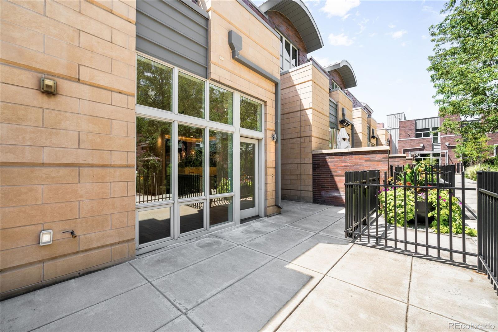 2133 18th Street, Unit RL Denver, CO 80202 - Photo 39 of 46 a view of a balcony with a potted plant