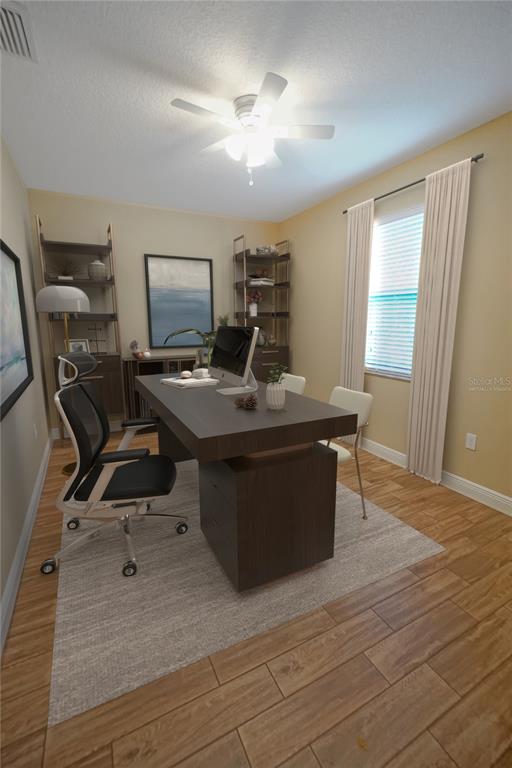 3525 West Ballast Point Boulevard Tampa, FL 33611 - Photo 5 of 25 a room with wooden floor and furniture