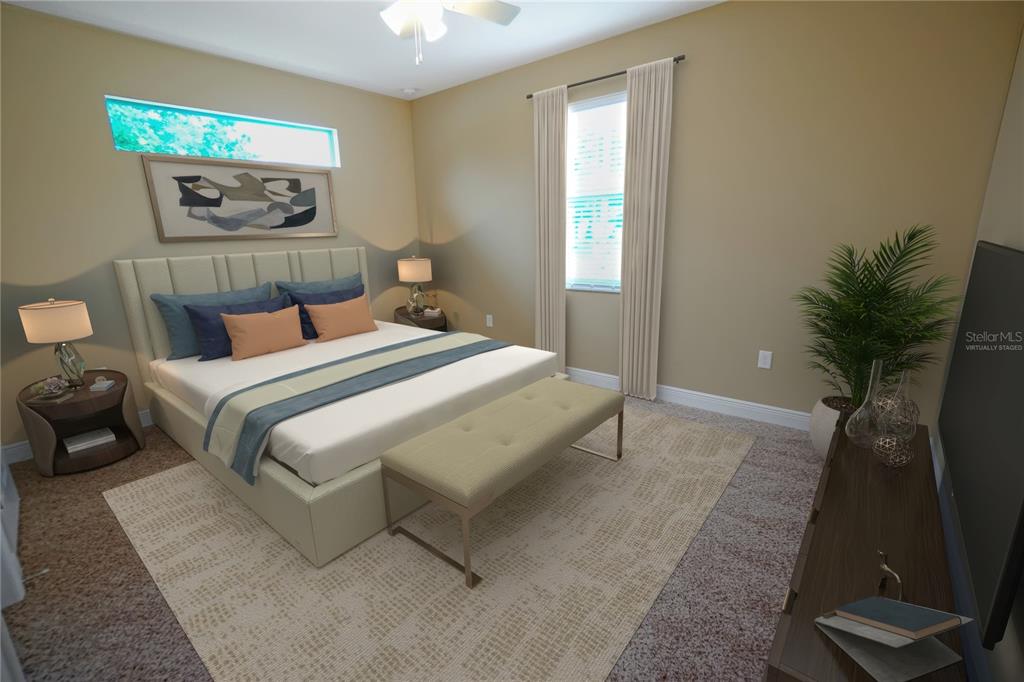 3525 West Ballast Point Boulevard Tampa, FL 33611 - Photo 6 of 25 a bedroom with a bed and a potted plant