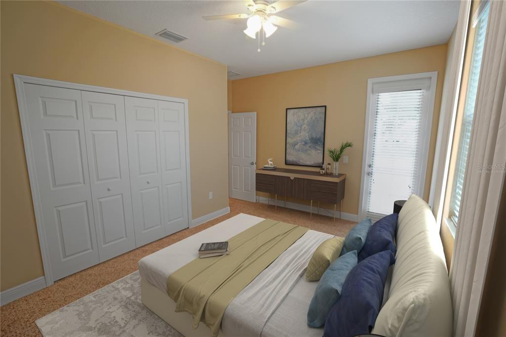 3525 West Ballast Point Boulevard Tampa, FL 33611 - Photo 9 of 25 a bedroom with a bed and a chandelier