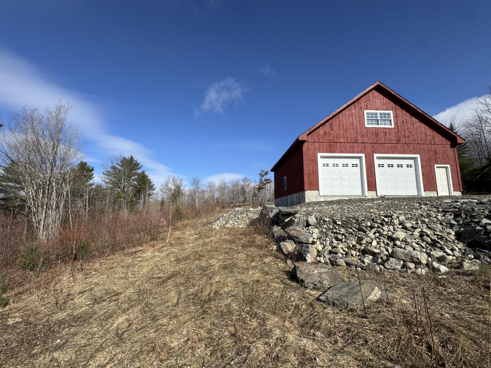 343 Guilford Center Road Guilford, ME 04443 - Photo 3 of 16 Plenty of slope for a septic system