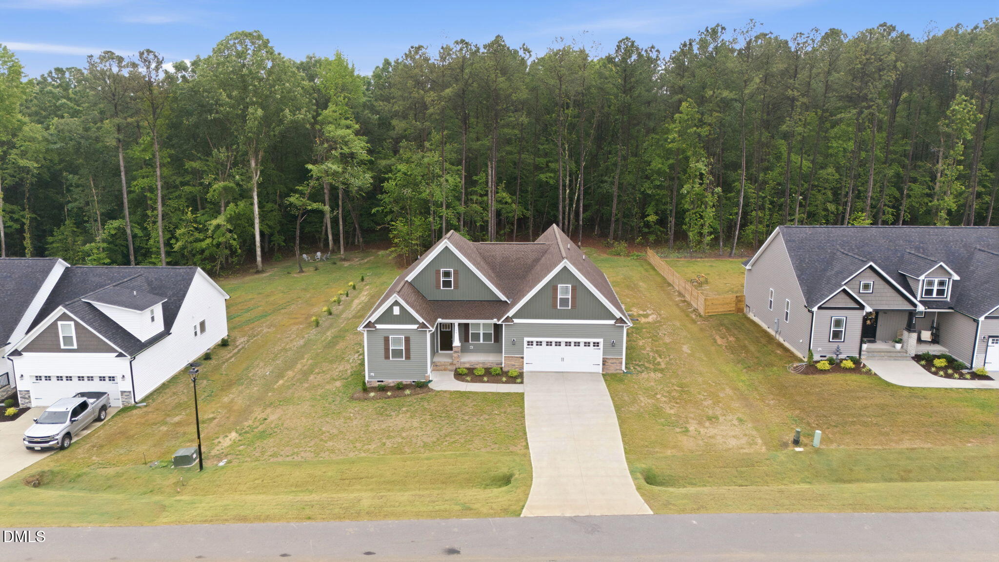 146 Seahawk Way Zebulon, NC 27597 - Photo 7 of 51 a house with trees in the background
