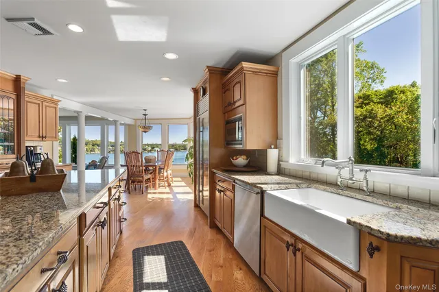 a view of a balcony with wooden floor