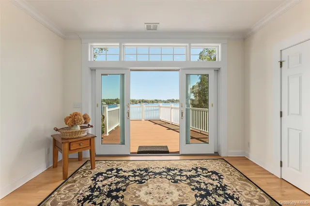 a bathroom with a sink a mirror and a shower