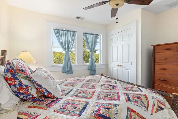 a view of balcony with wooden floor and outdoor seating