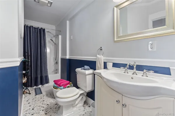 a view of a lake with couches and city view