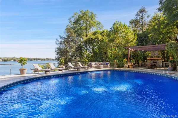a lake view with sitting space and garden