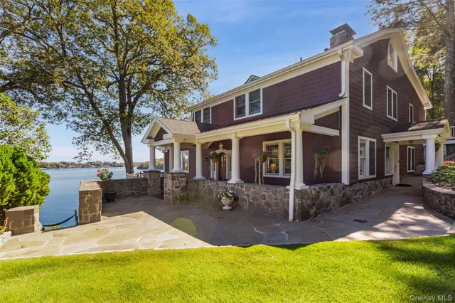 a view of balcony with wooden floor and fence