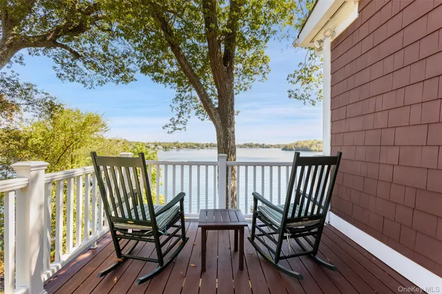 a view of a terrace with furniture and garden