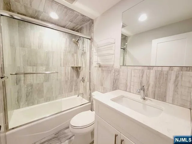 a bathroom with a sink and a bathtub