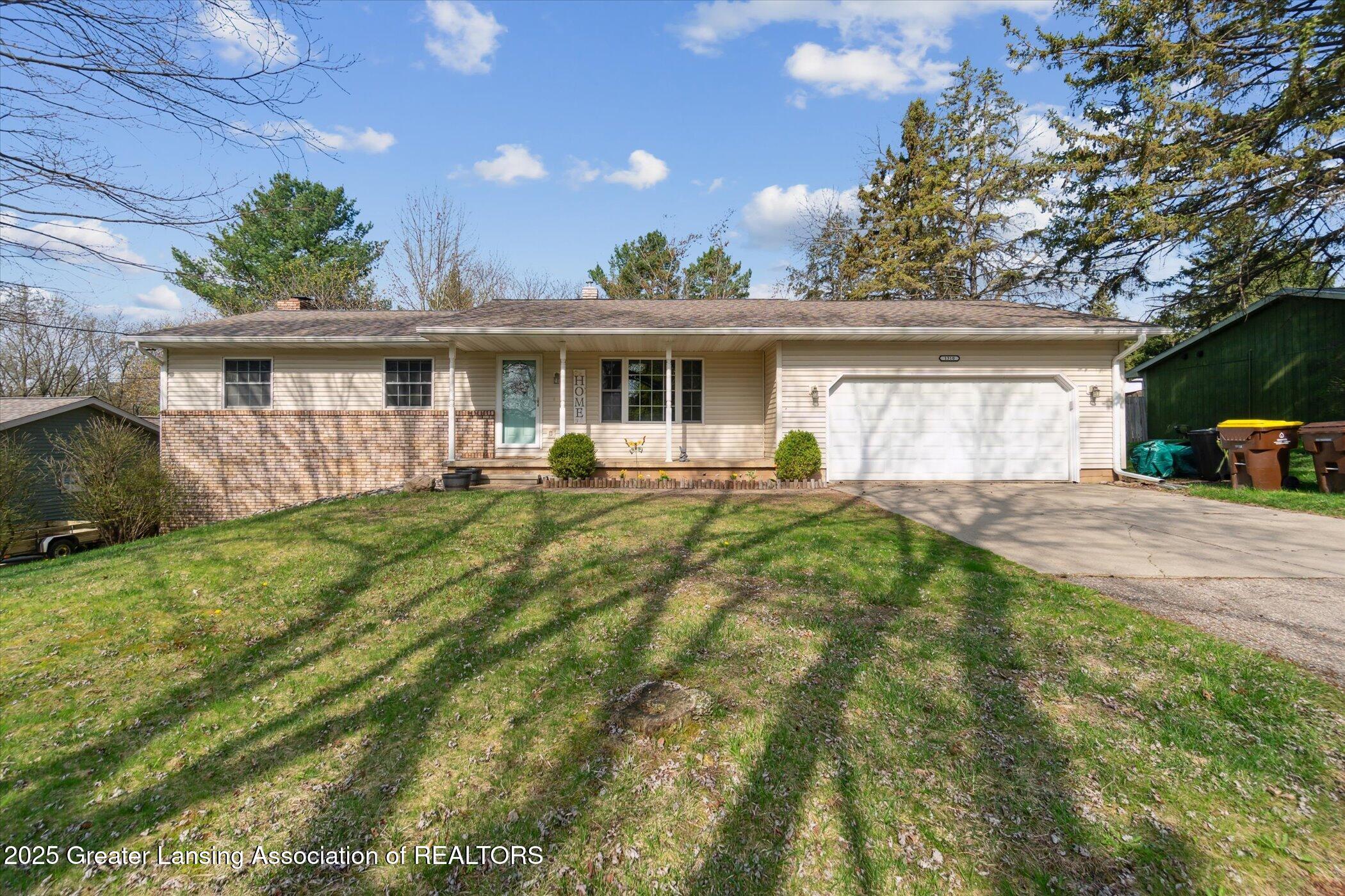 1310 Schavey Road Dewitt, MI 48820 - Photo 1 of 43 Exterior Front