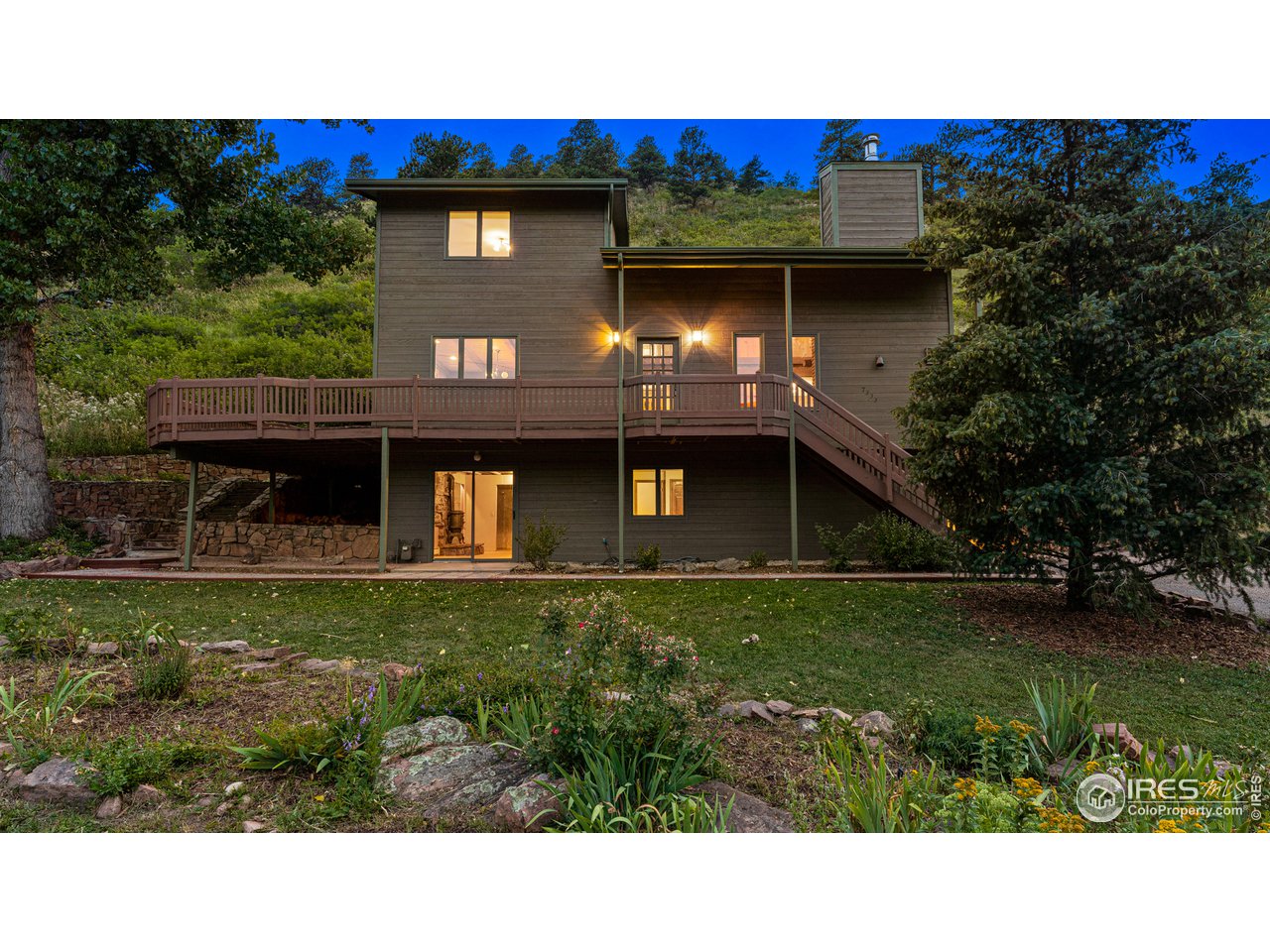 7333 Olde Stage Road Boulder, CO 80302 - Photo 1 of 40 a view of a house with a yard