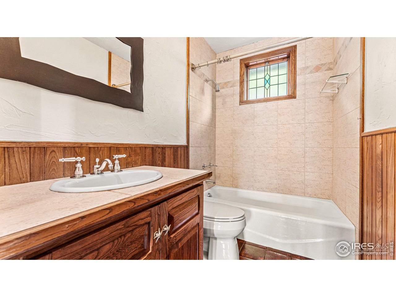 7333 Olde Stage Road Boulder, CO 80302 - Photo 10 of 40 a bathroom with a sink a toilet and a bathtub