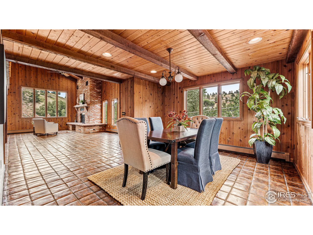 7333 Olde Stage Road Boulder, CO 80302 - Photo 13 of 40 a view of a dining room with furniture and a window