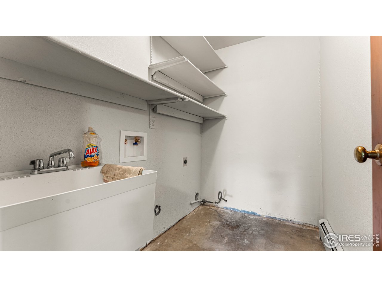 7333 Olde Stage Road Boulder, CO 80302 - Photo 23 of 40 a kitchen with a sink and cabinets
