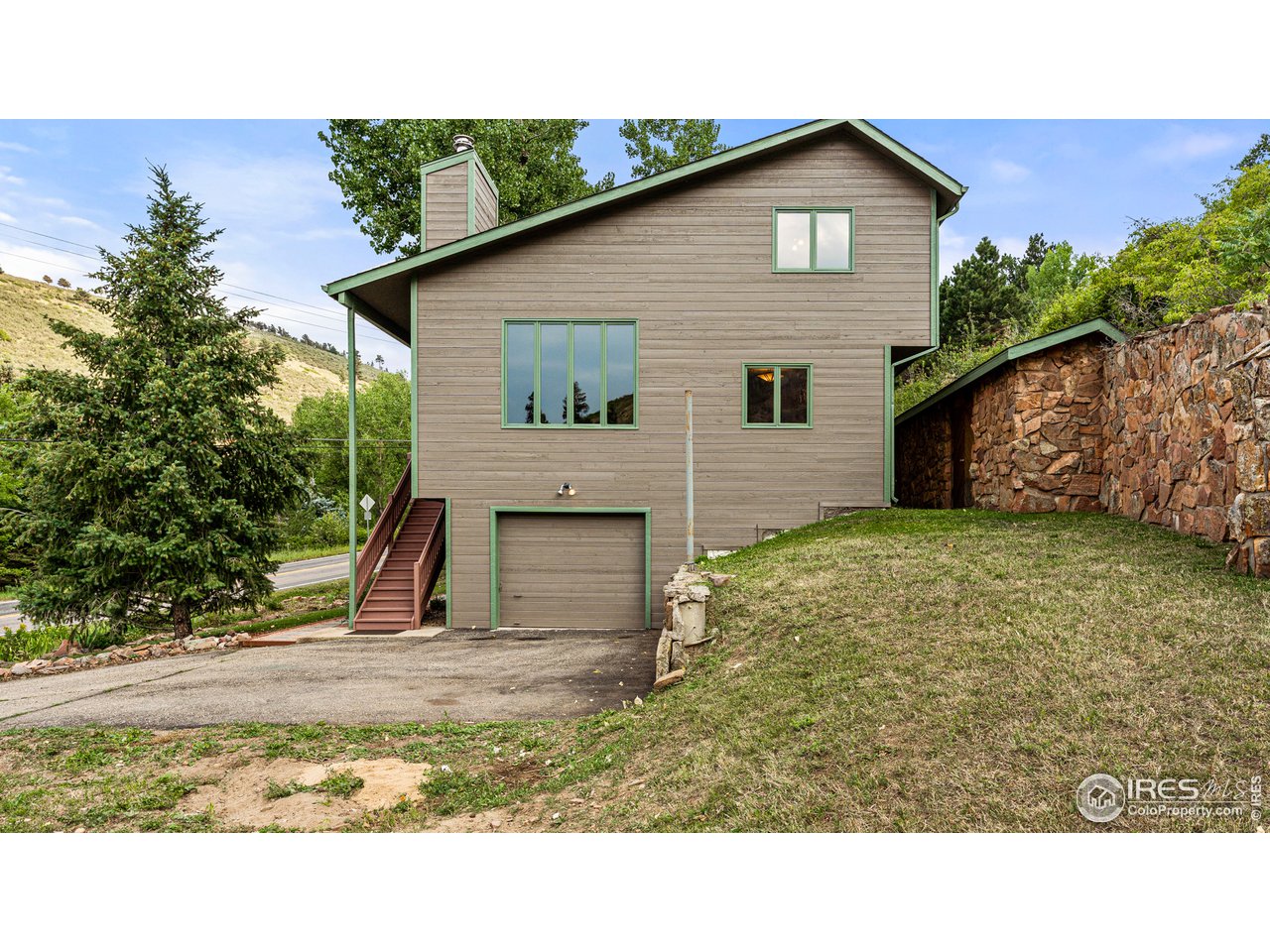 7333 Olde Stage Road Boulder, CO 80302 - Photo 31 of 40 a house view with a backyard space