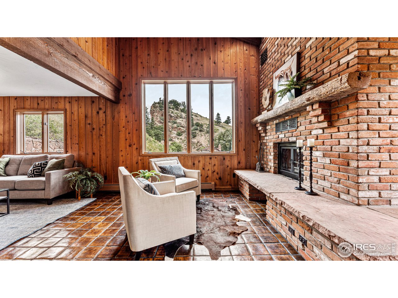 7333 Olde Stage Road Boulder, CO 80302 - Photo 4 of 40 a living room with furniture and a large window