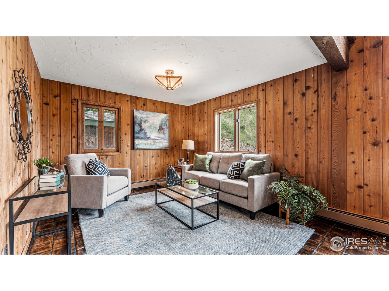 7333 Olde Stage Road Boulder, CO 80302 - Photo 6 of 40 a living room with furniture and a large window