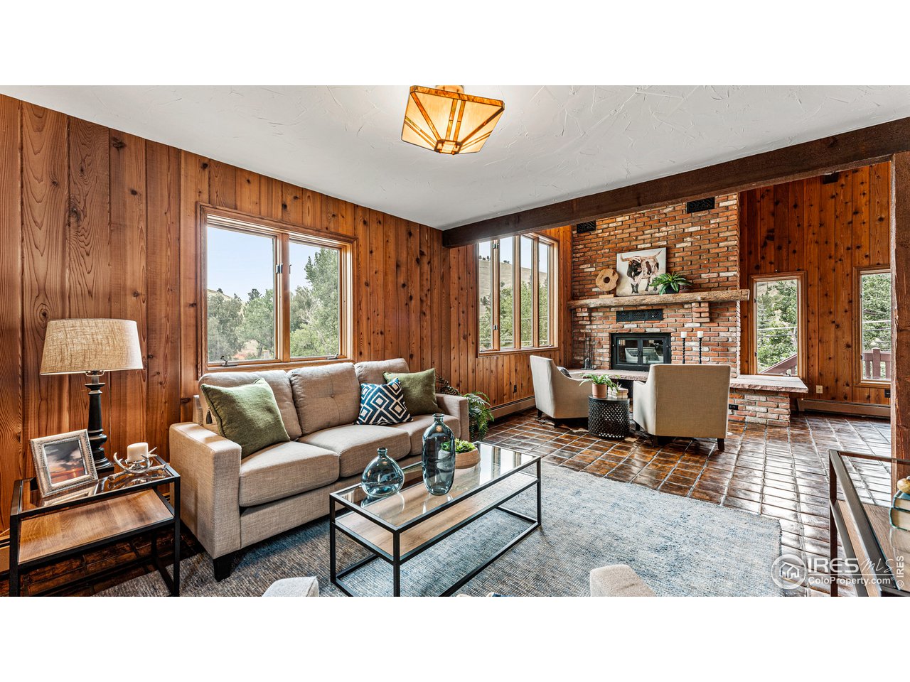 7333 Olde Stage Road Boulder, CO 80302 - Photo 8 of 40 a living room with furniture and a large window