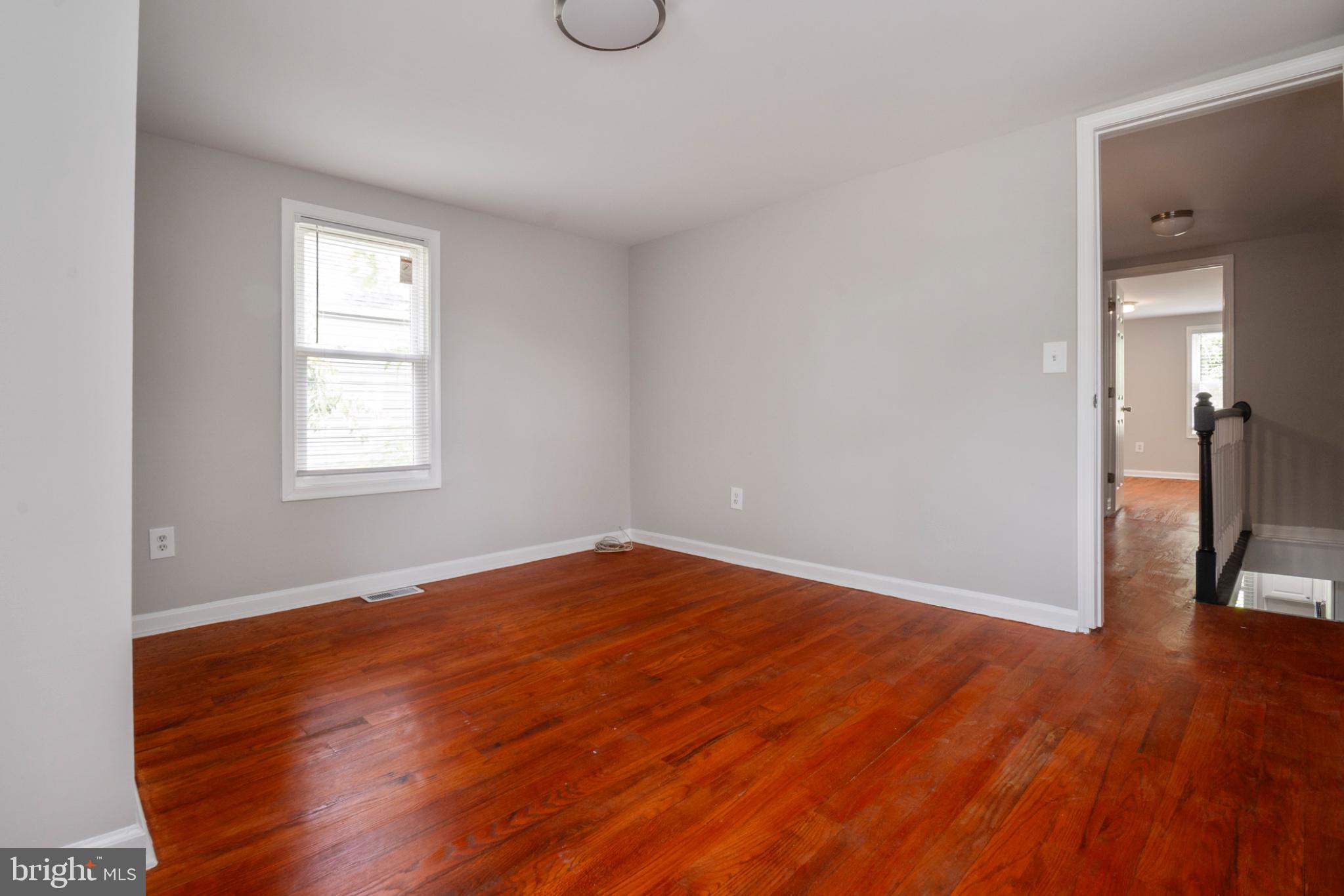 3708 7th Street Baltimore, MD 21225 - Photo 5 of 8 Bright and airy open space awaits.