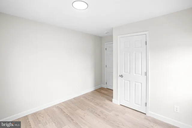 a view of a livingroom with wooden floor