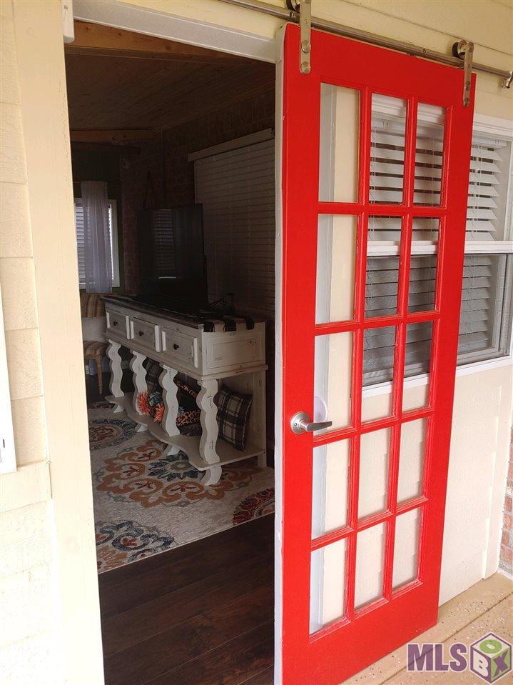 312 Lakecrest Avenue Baton Rouge, LA 70807 - Photo 12 of 22 Entrance to Sunroom from Patio
