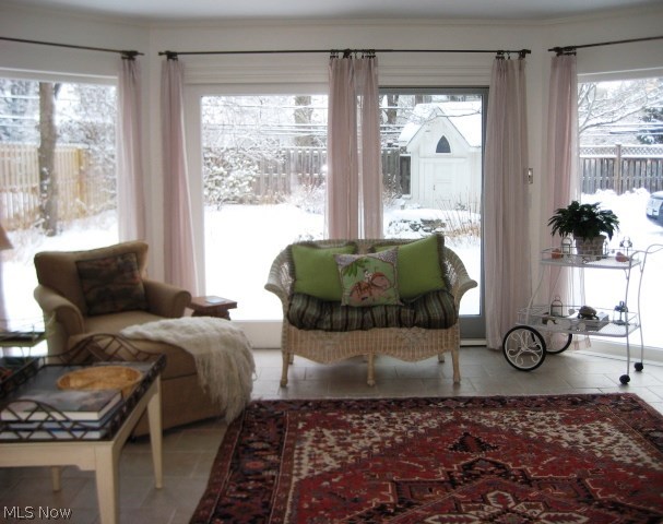 2947 Torrington Road Shaker Heights, OH 44122 - Photo 5 of 23 Fabulous Sun Room with ceramic tile floor and wall of windows with views of backyard and gardens