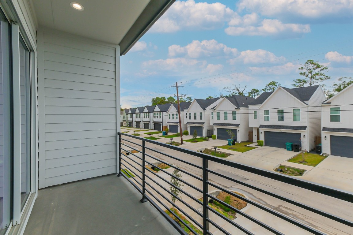 5703 B Balbo Street Houston, TX 77091 - Photo 11 of 46 a view of balcony with furniture