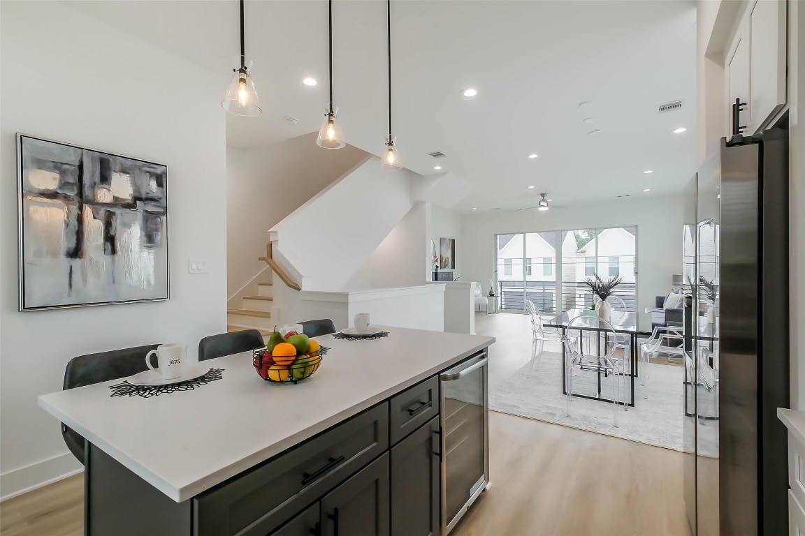 5703 B Balbo Street Houston, TX 77091 - Photo 20 of 46 a view of kitchen island and living room