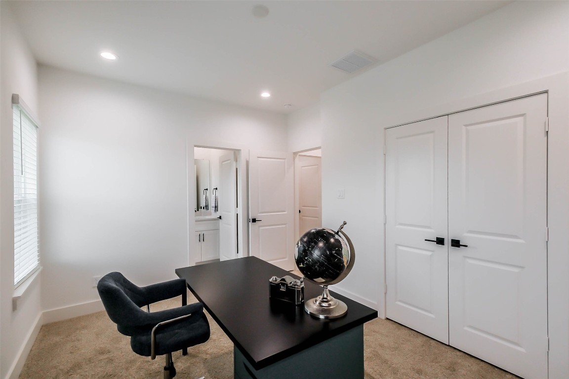 5703 B Balbo Street Houston, TX 77091 - Photo 23 of 46 a room with a couch and a window