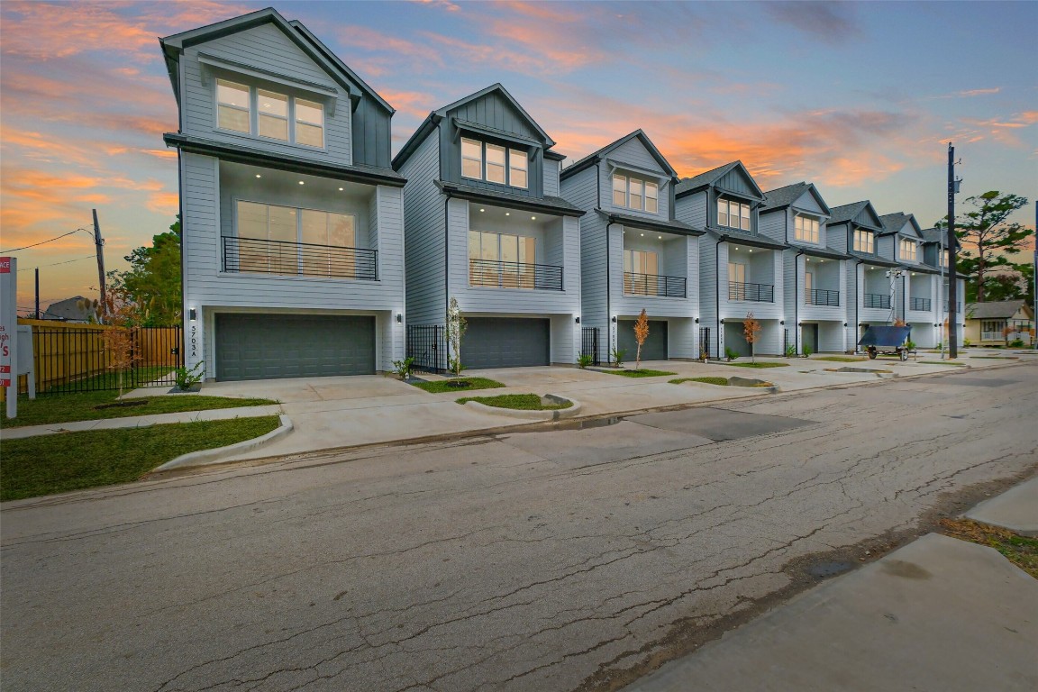 5703 B Balbo Street Houston, TX 77091 - Photo 42 of 46 a front view of a residential apartment building with a yard