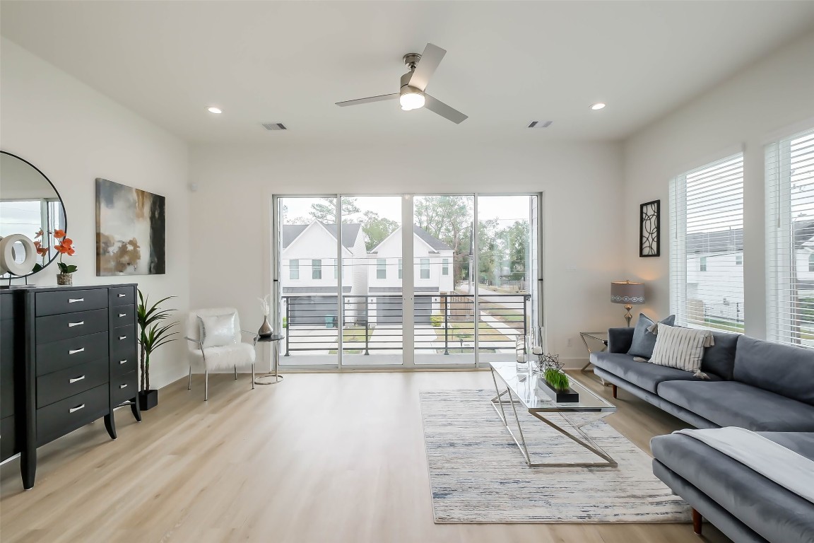 5703 B Balbo Street Houston, TX 77091 - Photo 10 of 46 a living room with furniture and a large window