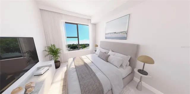 a bedroom with a bed potted plant and a window