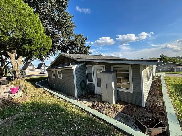 a front view of house with yard