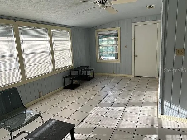 an empty room with windows