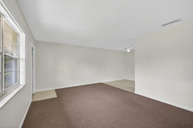 an empty room with a natural light