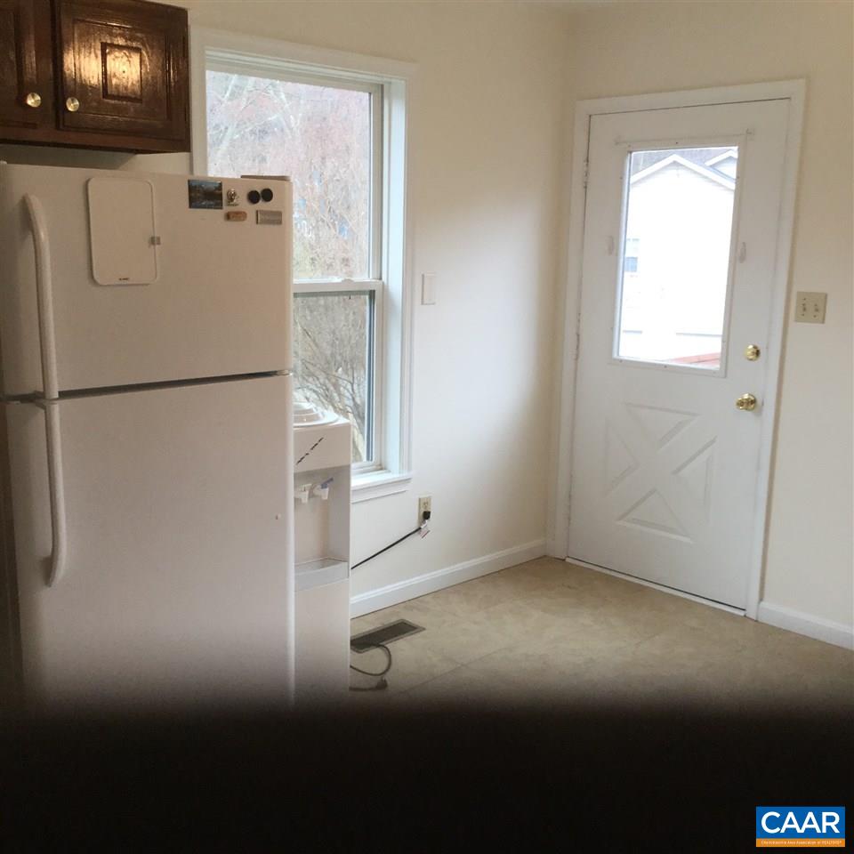 316 High View Road Stanardsville, VA 22973 - Photo 11 of 21 a white refrigerator freezer sitting in a kitchen