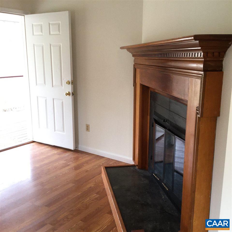 316 High View Road Stanardsville, VA 22973 - Photo 3 of 21 a view of an empty room with wooden floor and a window