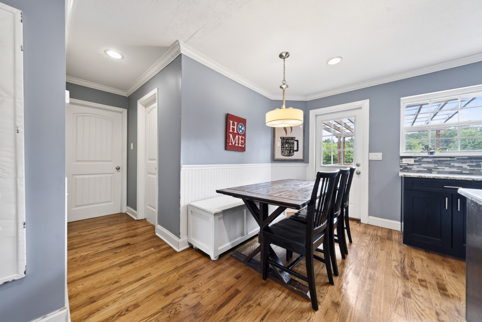 8023 Bethlehem Road Springfield, TN 37172 - Photo 30 of 55 a view of a dining room with furniture window and wooden floor