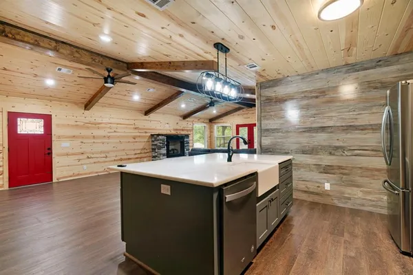 a kitchen with a stove and a microwave