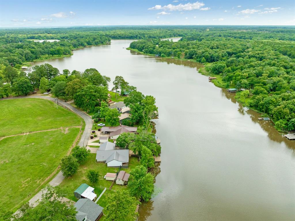 1205 Lakeside Drive Fort Towson, OK 74735 - Photo 37 of 38 a view of a lake with a city