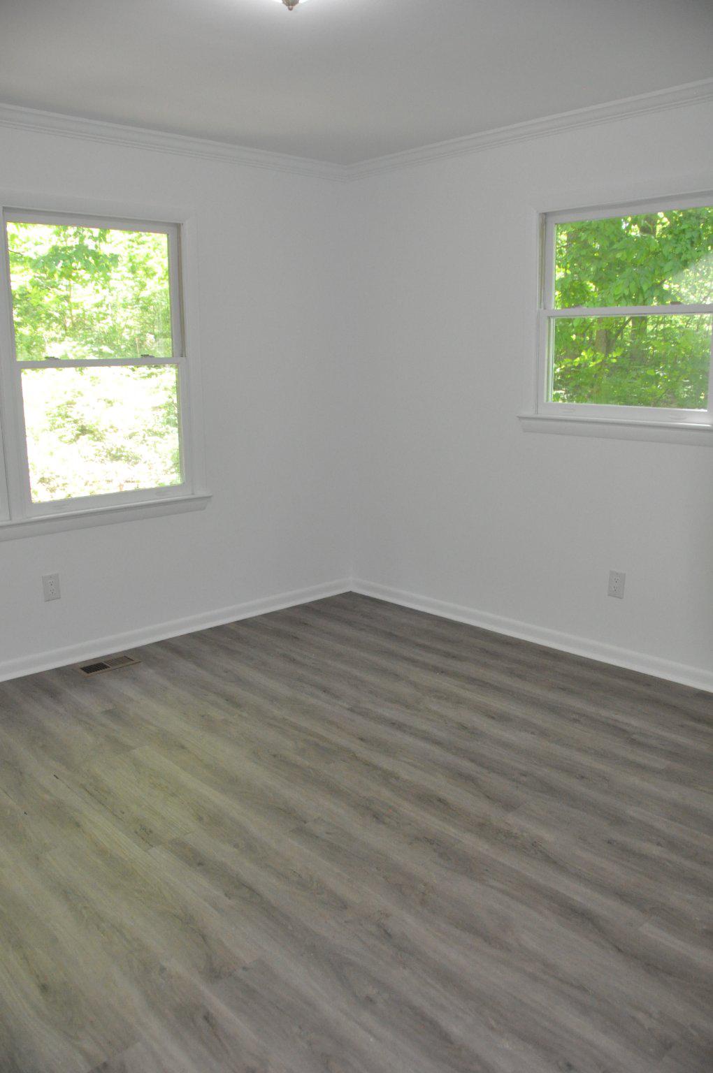 28 Henry Way Linden, VA 22642 - Photo 14 of 39 an empty room with wooden floor and windows