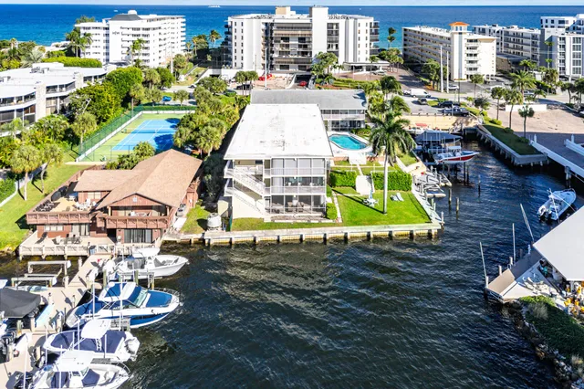 a view of a swimming pool with a lounge chairs