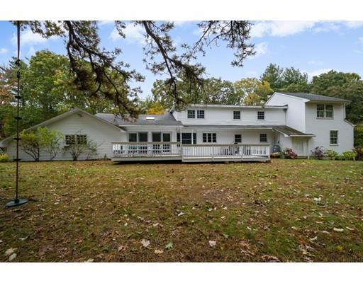 61 Maynard Road Sudbury, MA 01776 - Photo 3 of 38 a view of house with outdoor space and swimming pool