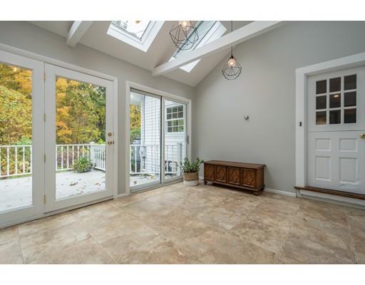 61 Maynard Road Sudbury, MA 01776 - Photo 4 of 38 a living room with furniture and large windows